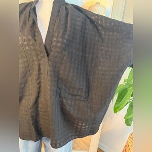 Two brand and made in the USA Women’s sheer black oversized short sleeve top.